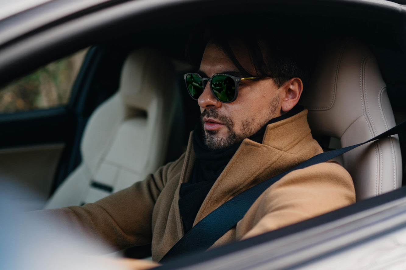 Photoshoot with Andrea Mazzuca in Milan, with Ferrari F12, for the new carbon-titanium collection CLM7 BRICK, with gold titanium frame and dark green lenses.