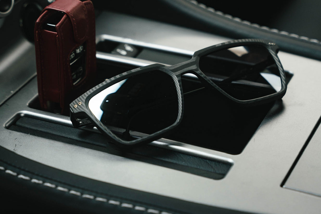 Roveri Eyewear new RVS Nero SS24 Carbon-Titanium Sunglasses Collection Product Page Photo, In Aston Martin Life Style Photoshoot.