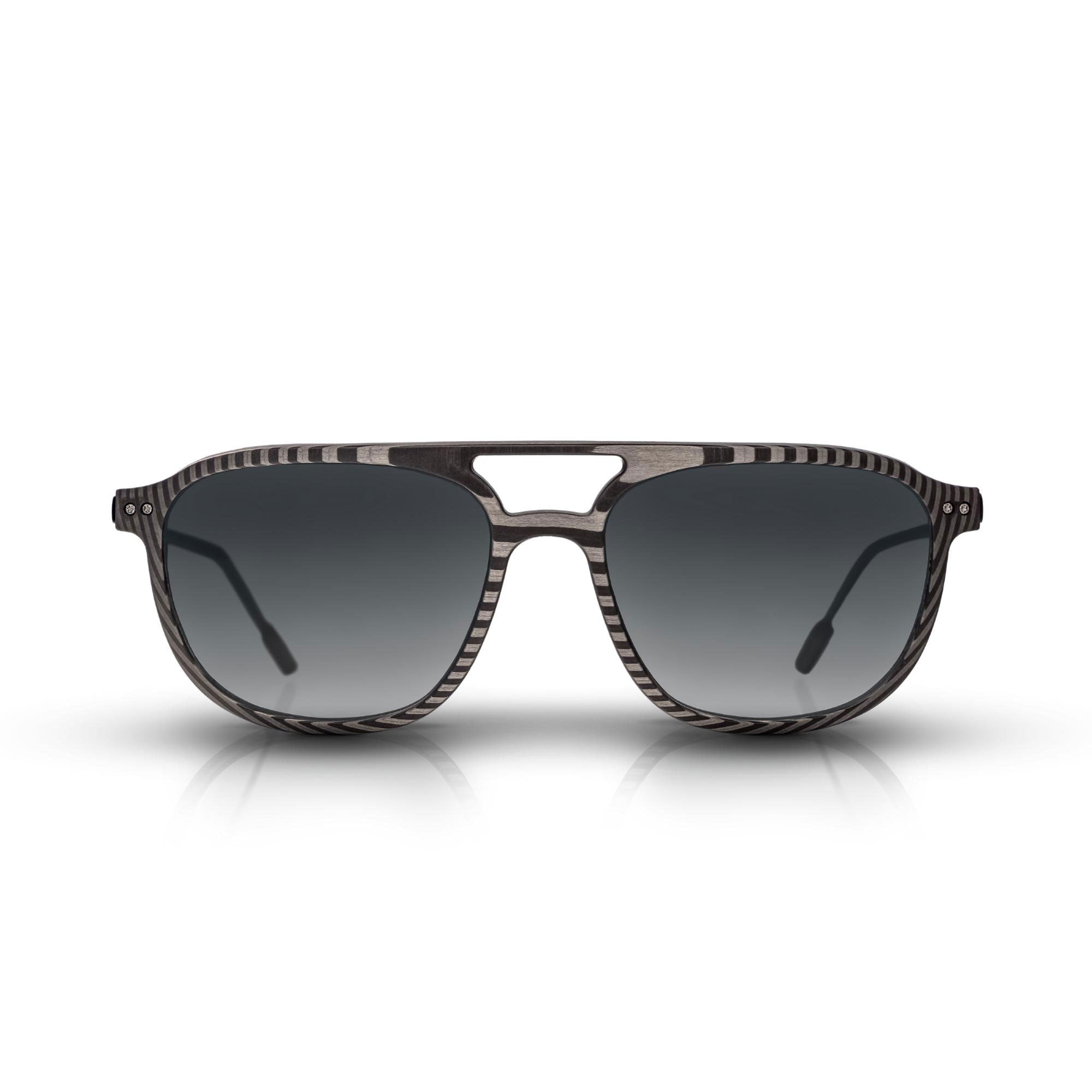 Front of the latest Roveri Eyewear The Carbon Noire from the latest Gunther Werks Collection, Vintage Pilot inspired sunglasses for men in UDCT® Machined Carbon Fiber, with dark gray gradient lenses and PVD coated Beta-Titanium frame, handmade in Italy.